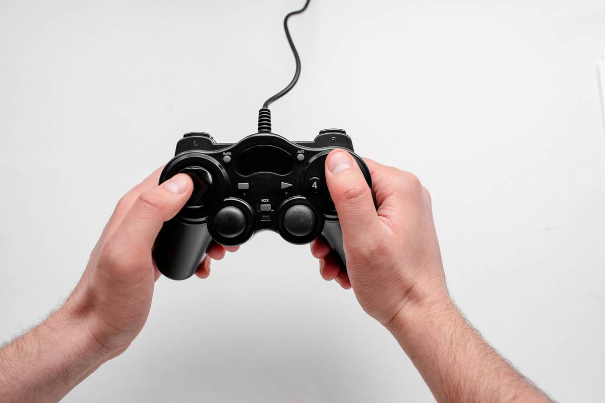 Close-up of dacota gaming nintendo switch controller adapter showing firmware update interface on laptop screen