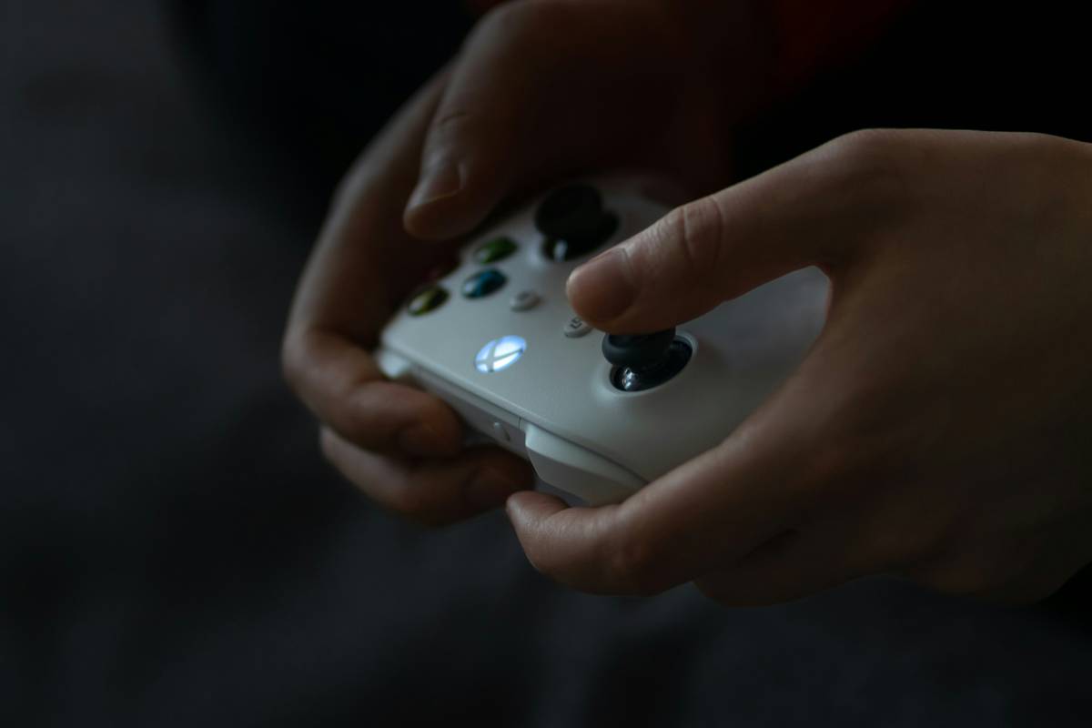 Professional gamer using game controller nintendo switch action setup with 8BitDo Pro 2 for low-latency gameplay