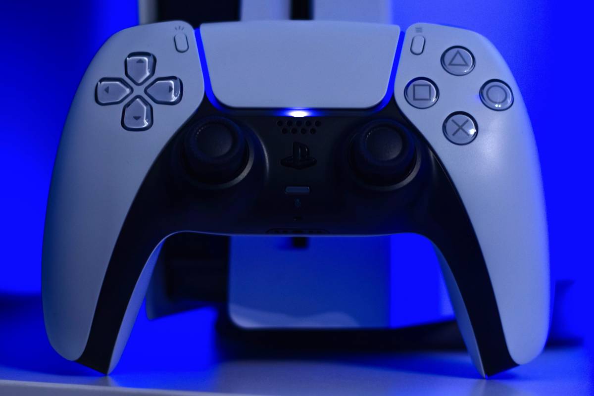 nintendo switch game controller gamestop displayed on store shelf with price tag and condition label